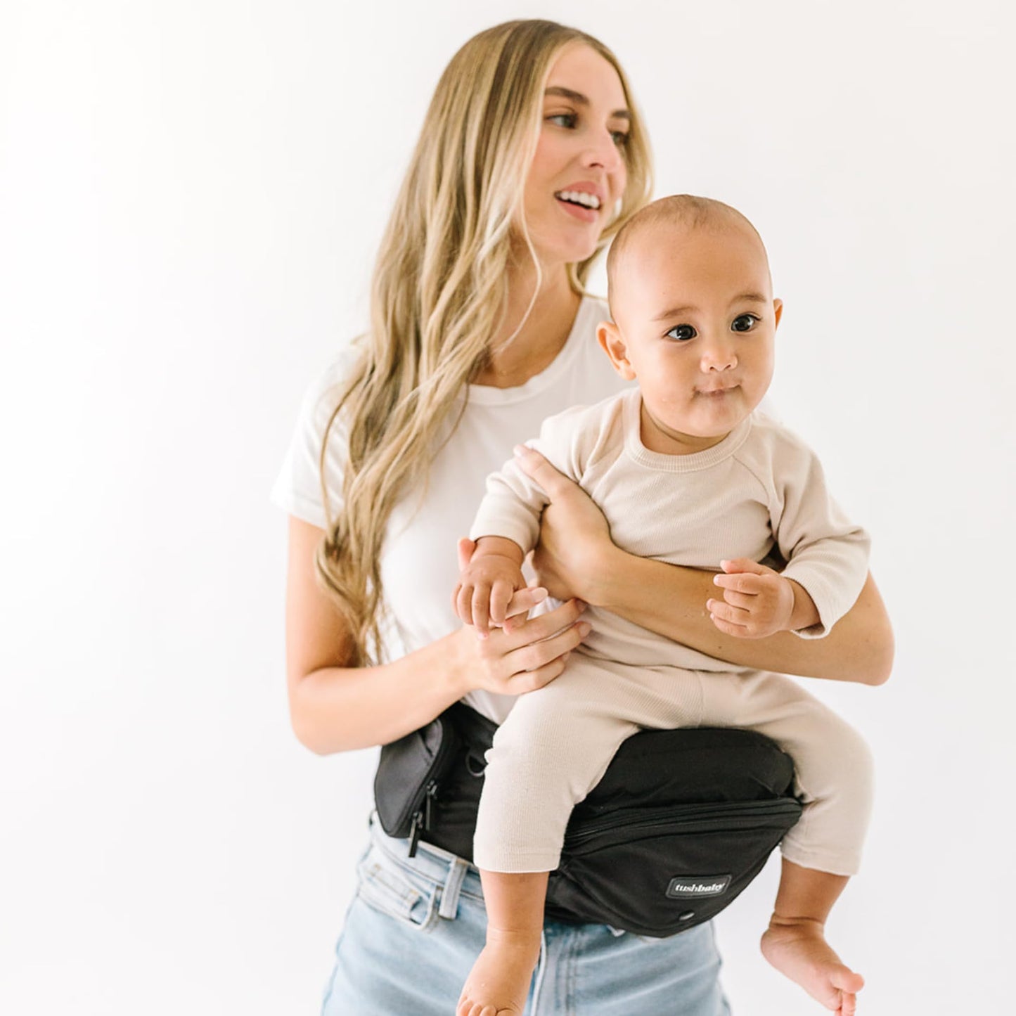 Tushbaby Safety-Certified Hip Carrier for Babies & Toddlers: Machine Washable Child Waist Seat for One Hand Support with Multi-Pocket Storage (23”-44” Waist, Holds Kids 0-3 yrs up to 45lbs) – Grey