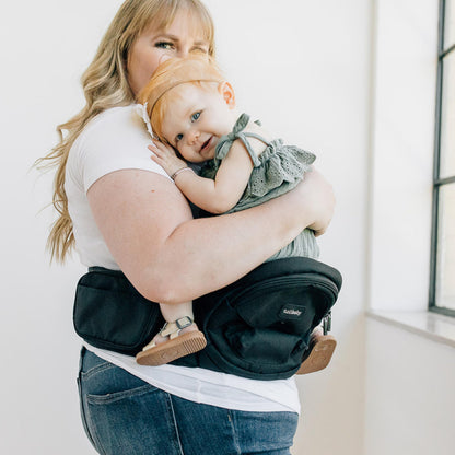 Tushbaby Safety-Certified Hip Carrier for Babies & Toddlers: Machine Washable Child Waist Seat for One Hand Support with Multi-Pocket Storage (23”-44” Waist, Holds Kids 0-3 yrs up to 45lbs) – Grey